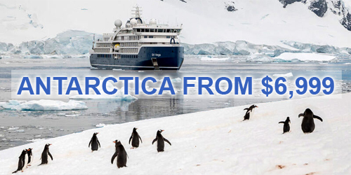 Swan Hellenic in Antarctica with penguins on the shore